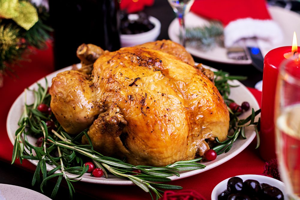 Designed by Freepik - https://www.freepik.com/free-photo/christmas-table-served-with-turkey-decorated-with-bright-tinsel-candles_7537369.htm#from_view=detail_alsolike