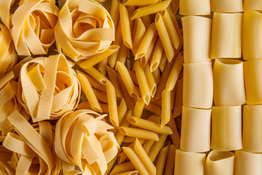 Designed by Freepik - https://www.freepik.com/free-photo/top-view-variety-pasta-types_1077888.htm#fromView=search&page=1&position=41&uuid=c7a2b9d8-1ae3-462e-99b7-b2c1e1c6baf7